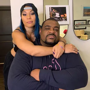 Keith Lee Embraces Mia Yim In A Heartfelt Moment Wallpaper