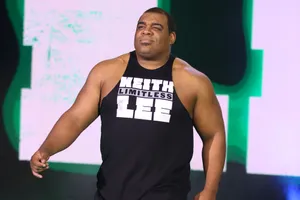 Keith Lee - The Limitless One In Black Singlet Wallpaper