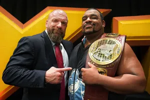 Keith Lee With Triple H Wwe Nxt Champion Wallpaper