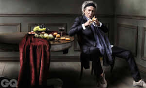 Keith Richards Elegant Portraitwith Fruit Table Wallpaper