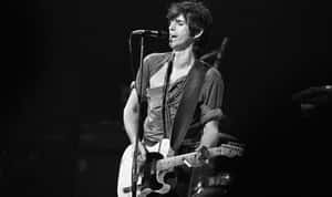 Keith Richards Performing Blackand White Wallpaper