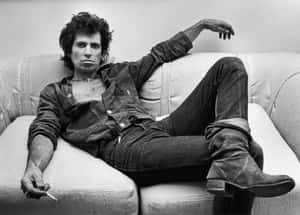 Keith Richards Relaxed Pose Wallpaper