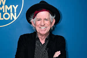 Keith Richards Smilingin Black Hat Wallpaper