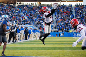 Kelee Ringo Athletic Interception Wallpaper