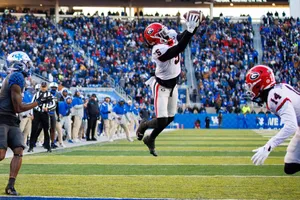 Kelee Ringo Athletic Interception Wallpaper