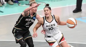 Kelsey Plum Action Basketball Game Wallpaper