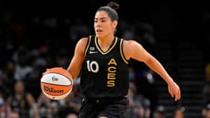 Kelsey Plum Action Shot Las Vegas Aces Wallpaper