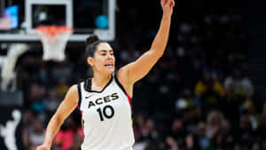 Kelsey Plum Celebration On Court Wallpaper