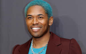 Kelvin Harrison Jr Smilingwith Teal Hair Wallpaper