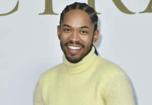 Kelvin Harrison Jr Yellow Turtleneck Smile Wallpaper