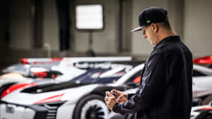 Ken Block Contemplating Race Car Wallpaper