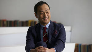 Ken Watanabe Smiling Formal Photography Wallpaper