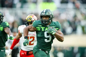 Kenneth Walker I I I Michigan State Football Action Wallpaper