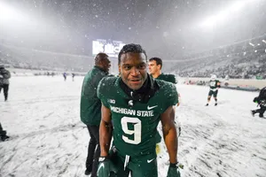 Kenneth Walker I I I Snowy Football Game Wallpaper