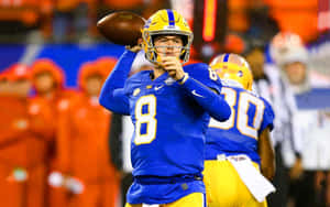 Kenny Pickett Quarterback Action Wallpaper