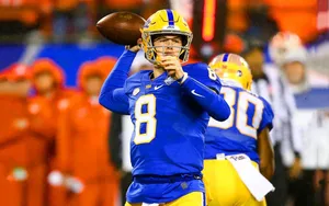 Kenny Pickett Quarterback Action Wallpaper