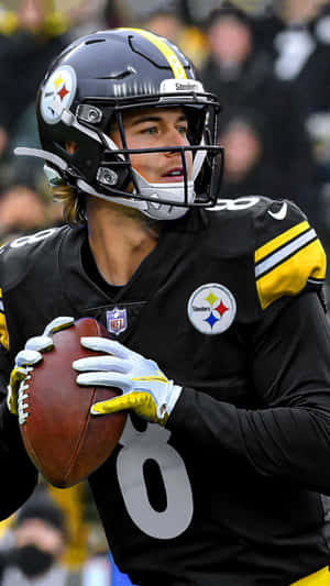 Kenny Pickett Steelers Quarterback Action Shot Wallpaper