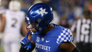 Kentucky Football Player Action Shot Wallpaper