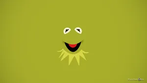 Kermit The Frog On A Bicycle In A Joyful Ride Wallpaper