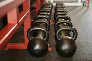 Kettlebellsin Row Gym Equipment Wallpaper