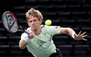 Kevin Anderson Running To Hit Ball Wallpaper