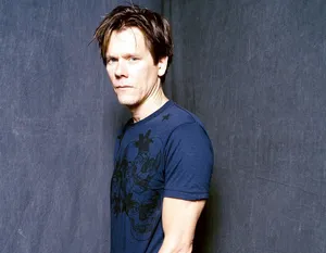 Kevin Bacon In Gray Wall Wallpaper