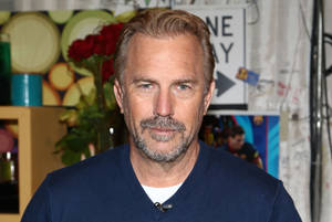 Kevin Costner In Blue Sweater Wallpaper