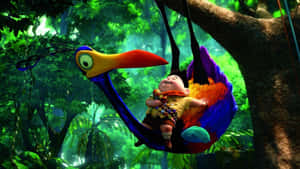 Kevin Cradling Russel On Tree In Up Movie Wallpaper