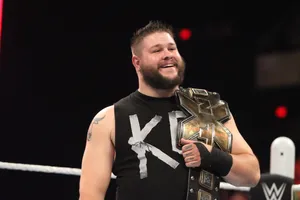 Kevin Owens Smiling Champion Wallpaper