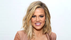 Khloe Kardashian In Beige Blazer Wallpaper