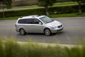Kia Sedona: A Sleek And Spacious Family Minivan Wallpaper