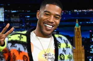 Kid Cudi Peace Sign T V Show Appearance Wallpaper