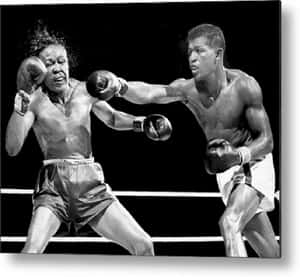 Kid Gavilan Punched By Opponent Wallpaper