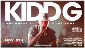 Kidd G Concert Promo Anywhere But Home Tour Wallpaper
