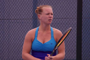 Kiki Bertens Flourishing In Blue Top Wallpaper