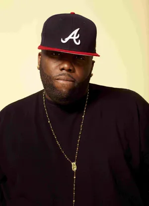 Killer Mike Portraitwith Atlanta Cap Wallpaper