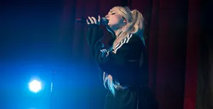 Kim Petras Glowing In Style Wallpaper