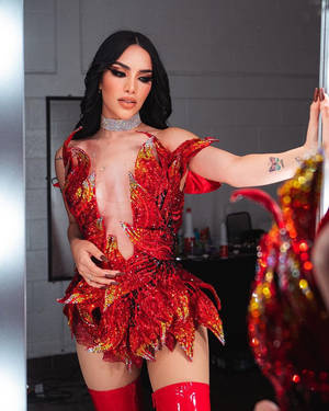 Kimberly Loaiza Fiery Red Costume Wallpaper