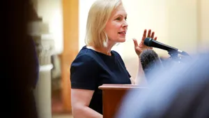 Kirsten Gillibrand Holds Microphone Wallpaper