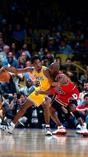 Kobe Bryant And Michael Jordan - Basketball Legends Wallpaper