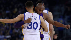 Kobe Bryant (left) And Stephen Curry (right), Legendary Basketball Players Wallpaper