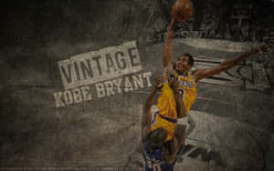 Kobe Bryant Making History On The Basketball Court Wallpaper