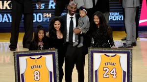 Kobe Bryant Retirement Ceremonywith Family Wallpaper