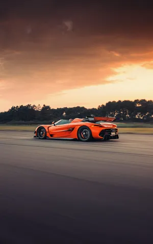 Koenigsegg Jesko Orange Sunset Drive Wallpaper