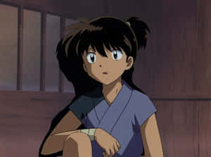 Kohaku, A Mesmerizing Ornamental Koi Fish, Gracefully Swimming In A Serene Pond. Wallpaper