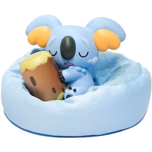 Komala Figurine With Cushion Wallpaper
