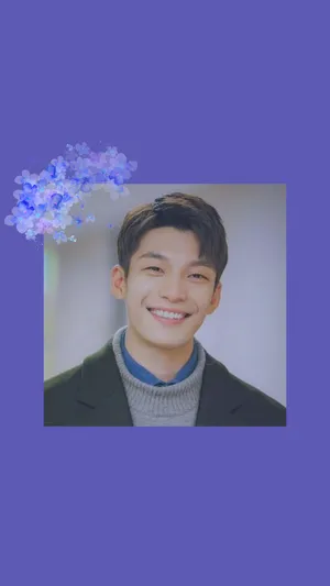 Korean Actor Wi Ha Joon Smiling Candidly Wallpaper