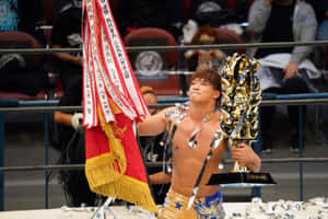 Kota Ibushi Holding The Trophy At G1 Climax Wallpaper