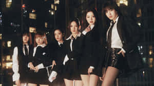 Kpop Group Ive Nighttime City Backdrop Wallpaper