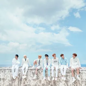 Kpop_ Group_ Skyline_ Serenity Wallpaper